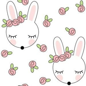 sleeping bunnies-with-pink-rosebuds-on-white