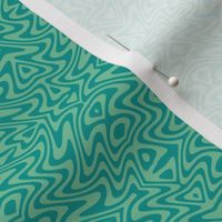 small butterfly ripples in surf teal