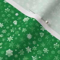 photographic snowflakes on Christmas green (small snowflakes)