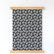 Tiny Trotting Keeshond and paw prints - black