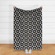 Trotting Papillons and paw prints - black