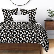 Trotting Papillons and paw prints - black