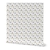 Tiny Trotting Papillons and paw prints - white