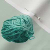 little yarn balls - green, pink, teal, olive