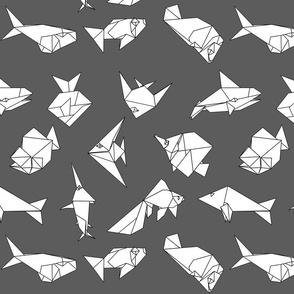 Origami fish folds on grey