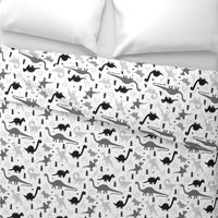 Adorable dino boys fabric with black and gray dinosaur geometric triangles and funky animal illustration theme for kids