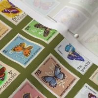 butterfly postage stamps from Hungary, life-sized on olive green