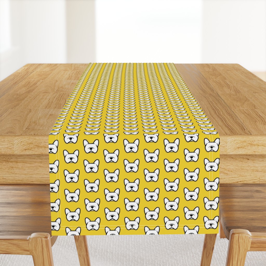 French Bulldogs  on a bright sunny yellow 