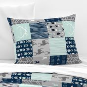 Wholecloth Patchwork Deer in navy, grey and mint. Rotated. Elk, arrows, woodgrain