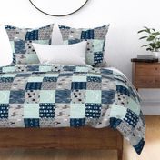 Wholecloth Patchwork Deer in navy, grey and mint. Rotated. Elk, arrows, woodgrain