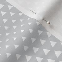 halftone triangles light grey reversed