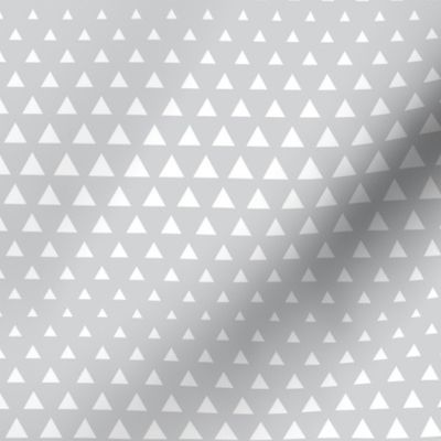 halftone triangles light grey reversed