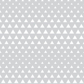 halftone triangles light grey reversed