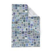 Blue stamp collection: international stamps on neutral grey