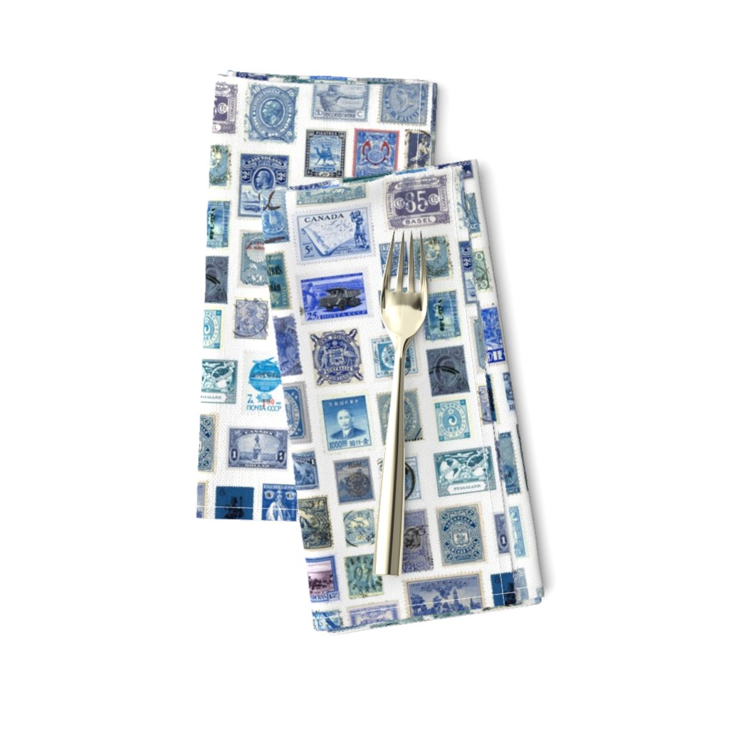 Blue stamp collection: international stamps on white
