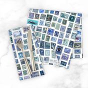 Blue stamp collection: international stamps on white