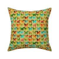 Colorful butterflies on yellowy-green linen weave by Su_G_©SuSchaefer