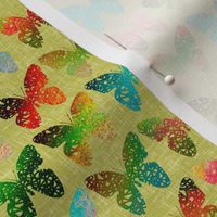 Colorful butterflies on yellowy-green linen weave by Su_G_©SuSchaefer