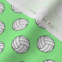 One Inch Black and White Volleyballs on Mint Green