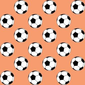 One Inch Black and White Soccer Balls on Peach