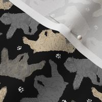 Tiny Trotting Bouvier des Flandres and paw prints - black