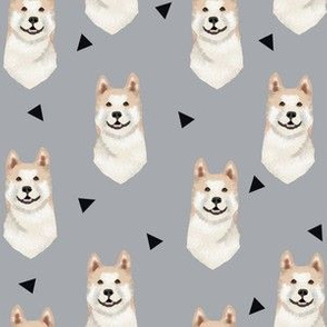 akita geometric fabric dogs and triangles design