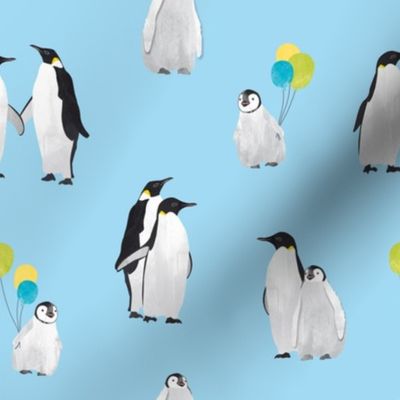 Penguin family on blue