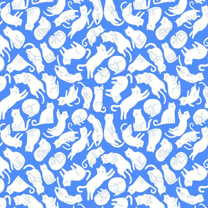 White_cats_on_blue_pattern