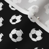 One Inch Black and White Soccer Balls on Black