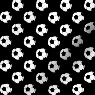 One Inch Black and White Soccer Balls on Black