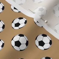 One Inch Black and White Soccer Balls on Camel Brown
