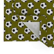 One Inch Black and White Soccer Balls on Olive Green