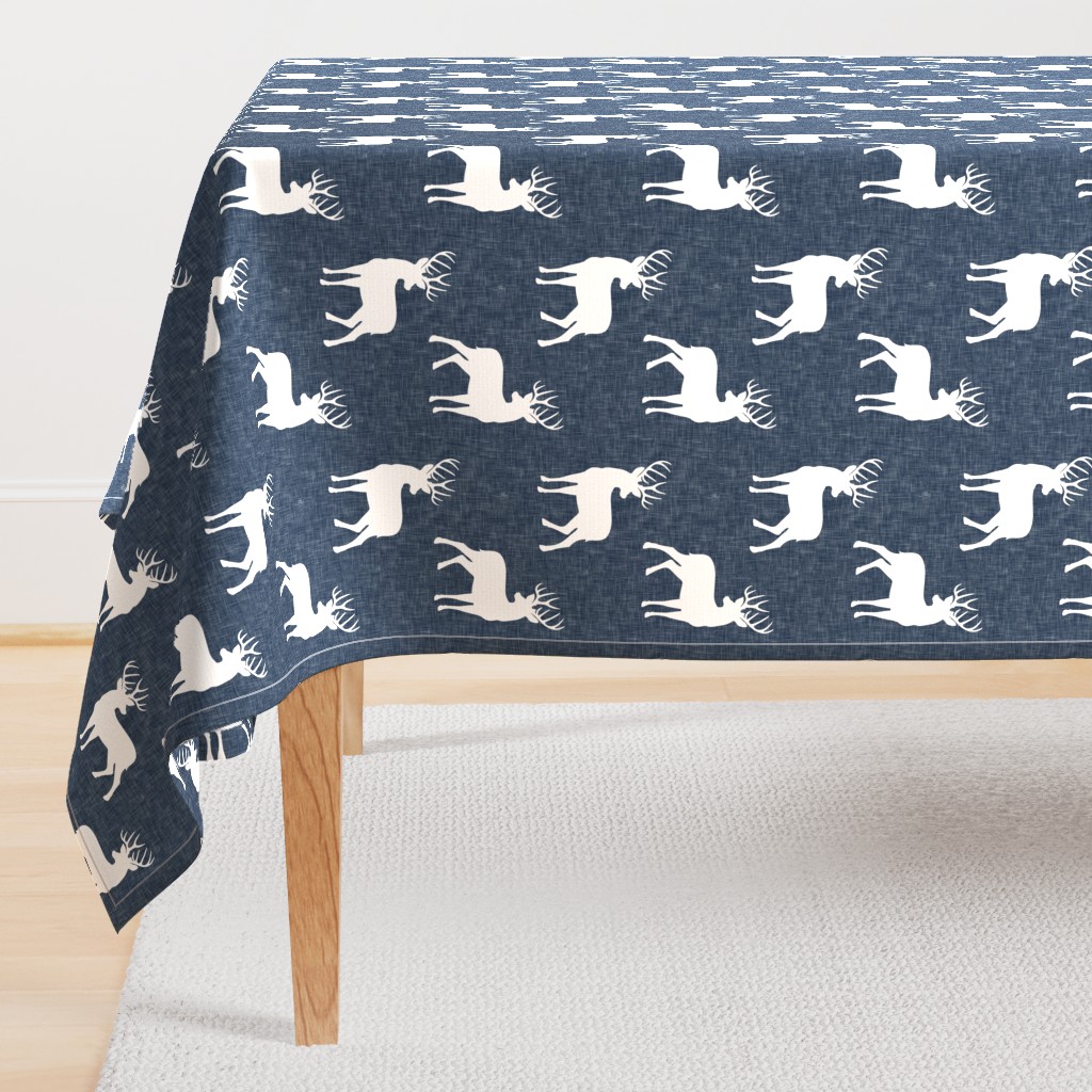 bucks on navy linen