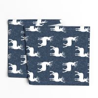 bucks on navy linen