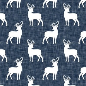 (small scale) bucks on navy linen