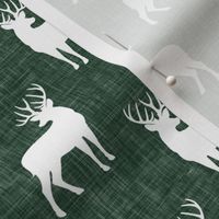 (small scale) bucks on green linen