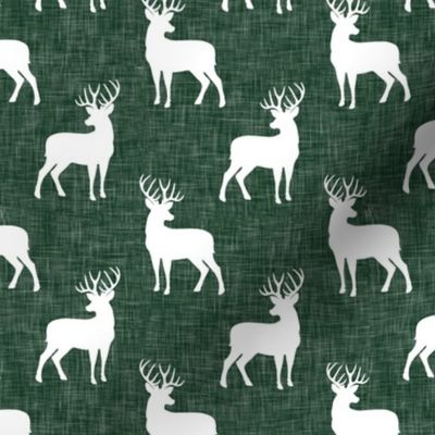 (small scale) bucks on green linen