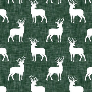 (small scale) bucks on green linen