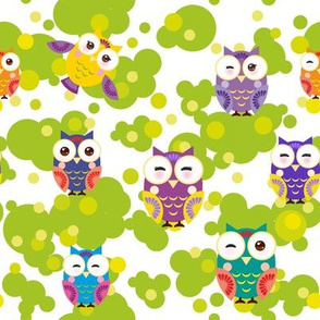  bright colorful owls and green leaves on white background. illustration