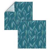 Eucalyptus leaves on teal