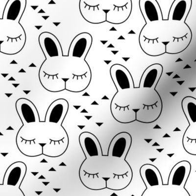 bunnies-sleeping---white-and-black