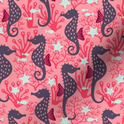 Seahorse in coral reef pink