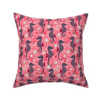 Seahorse in coral reef pink