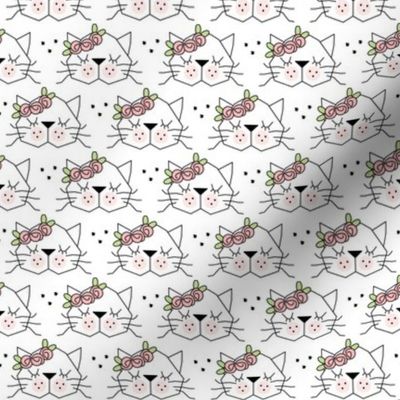 small kitty faces with rosebuds on white
