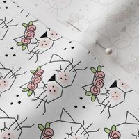 small kitty faces with rosebuds on white