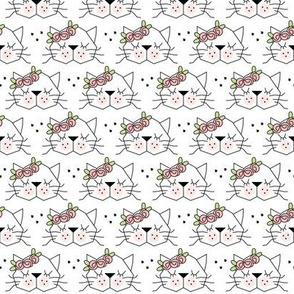 small kitty faces with rosebuds on white