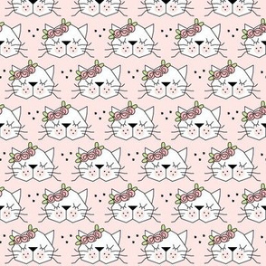 small kitty faces with rosebuds on pink