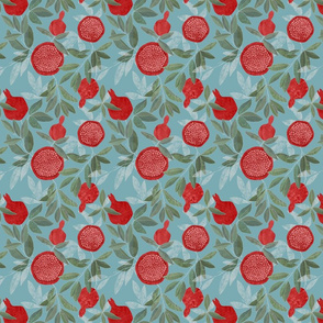 Red pomegranates on sky blue