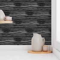 Horizontal Illusion White Brush Stroke Stripes on Black