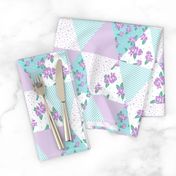 floral triangle cheater quilt turquoise and purple florals nursery girls fabric